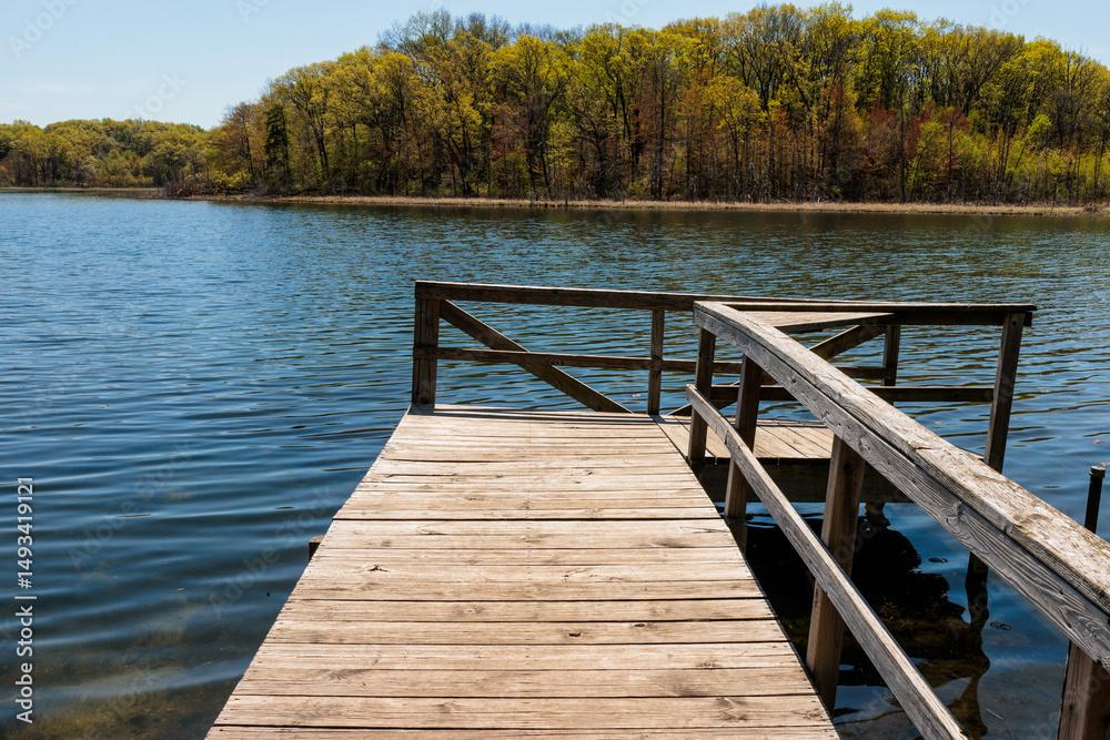 The small boat pier on Ennis (Fountain) Lake within the John Muir Memorial Park, Montello, Wisconsin The small boat pier on Ennis (Fountain) Lake within the John Muir Memorial Park, Montello, Wisconsin