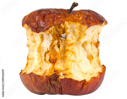 A partially eaten, decaying apple core with wrinkled skin and visible bite marks.