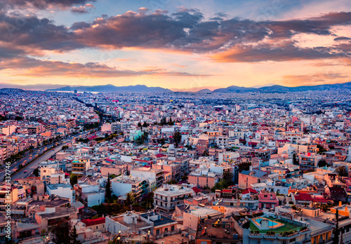 Spectacular morning cityscape of Athens. Urban summer scene of Greece, Europe. Wonderful sunrise in the big sity. Traveling concept background.