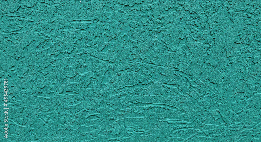 Fototapeta premium Teal Textured Surface: Close-Up of Rough Stucco-Like Finish