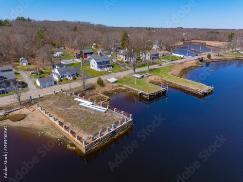 Dighton Wharves aerial view on Taunton River in spring at Dighton Wharves Historic District, Dighton, Massachusetts MA, USA.  photo