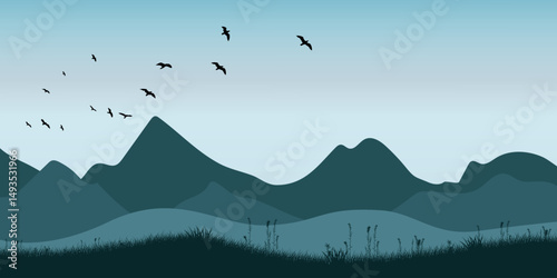 A landscape with silhouettes of mountains. Birds are flying in the sky, and a field with grass is visible in front of the mountains.