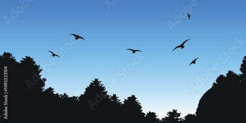 silhouette of a forest against a light blue sky with several flying birds. The silhouette of the trees is dark, contrasting, and the sky has a gradient from light to more saturated blue.
