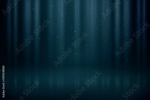 Dark blue spotlight background with soft particles and glow effect