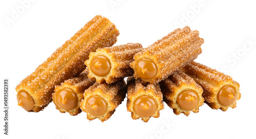 Mini churros filled with dulce de leche, sprinkled with sugar and cinnamon, isolated