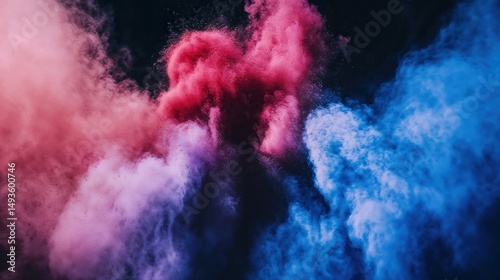 Pink and blue powder explosion on black background