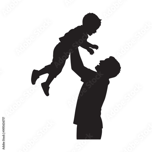 Silhouette of a father carrying his young son