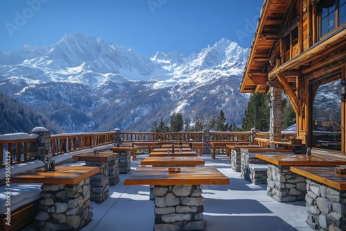 Cozy alpine terrace with mountain backdrop high resolution picture