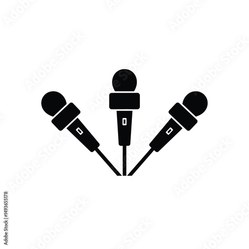 Three microphones converging press conference interview