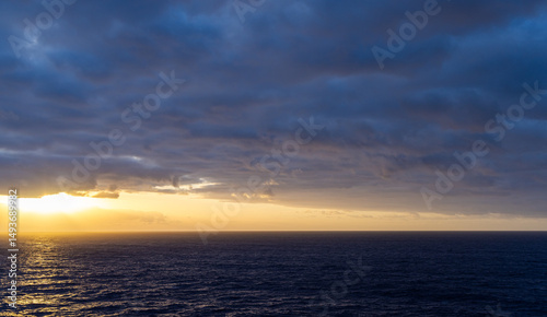 Beautiful Sunset Over the Pacific Ocean Horizon with Vibrant Cloudscape