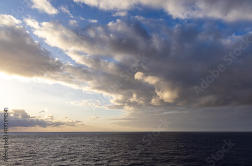 Wallpaper Mural Cloudscape Over Calm Ocean During Sunset With Dramatic Clouds and Faint Horizon Torontodigital.ca