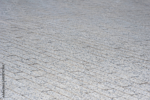 Perspective view of gray paving slabs.