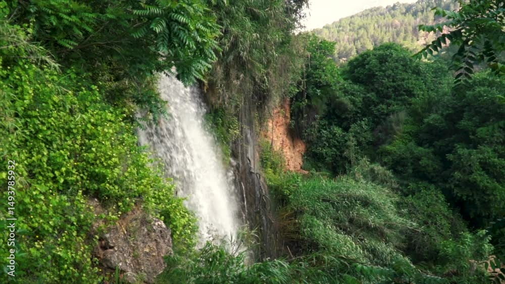 Wonderful waterfall in the forest, in Anna, Comunidad Valenciana (Spain)