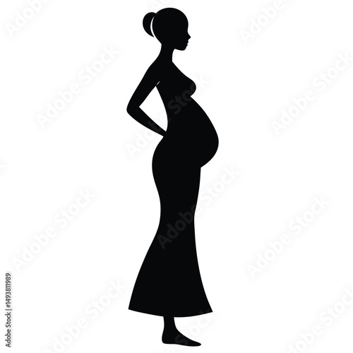 Silhouette of pregnant woman standing with hands on back in elegant maternity dress