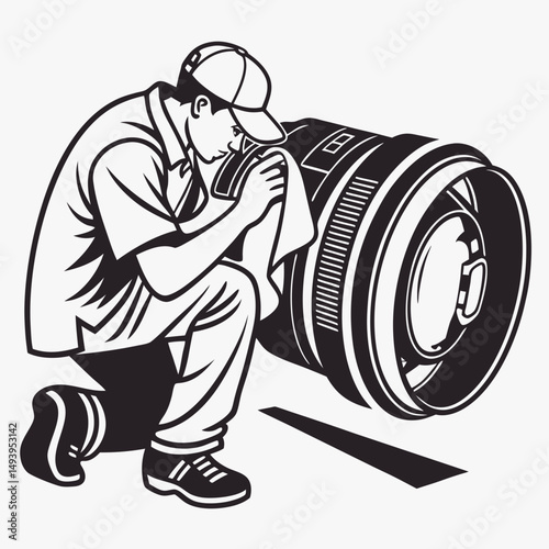 Technician cleaning large camera lens carefully