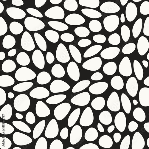 Vector seamless pattern. Abstract spotty texture. Natural monochrome design. Creative background with rounded spots. Decorative swatch with smooth pebbles.