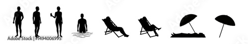 Silhouettes of people enjoying summer vacation activities by a beach