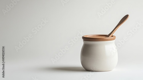 Jar with a Wooden Spoon