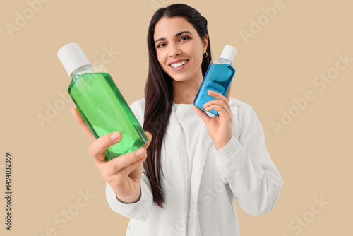 Female dentist with bottles...