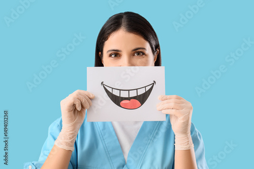 Female dentist with paper s...