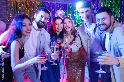 Young people with drinks at...