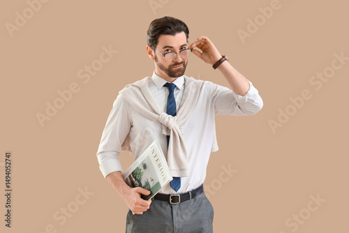 Handsome businessman with i...