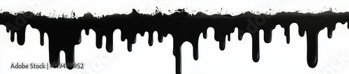 Thick black liquid dripping unevenly against a white background creating a striking contrast