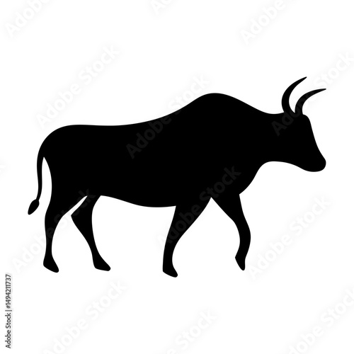 Silhouette of a bovine animal walking in a white background space