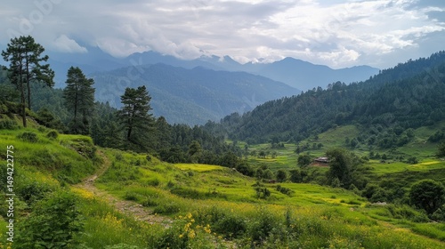 Wallpaper Mural Serene Mountain Landscape with Lush Green Valleys and Majestic Peaks Under a Dramatic Sky in a Peaceful Natural Environment Torontodigital.ca