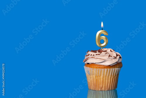 Birthday Or Anniversary Cupcake with Lit Candle; Number 6 Candle.