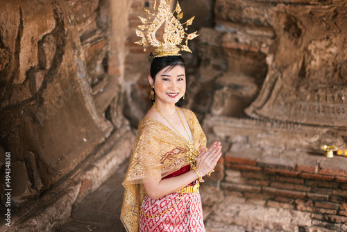 Thai traditional dress in ayuthaya temple cultural portrait photography serene environment captured moment