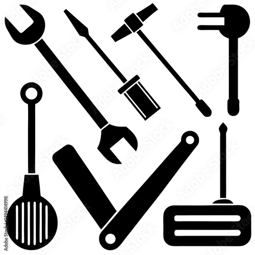 Assorted black and white mechanic tools
