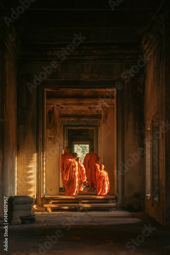 Monks Walking Through Angkor Wat at Sunset, Cambodia