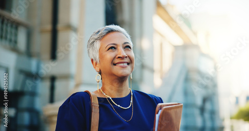 Lawyer, documents and thinking with business woman in city for court case files, trial assessment and attorney brief. Plead agreement, legal research and advocate paperwork with mature person outdoor