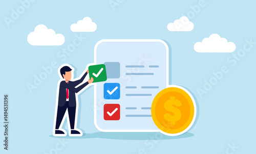 Businessman placing checkmark on task list document beside dollar coins representing business financial milestone or progress