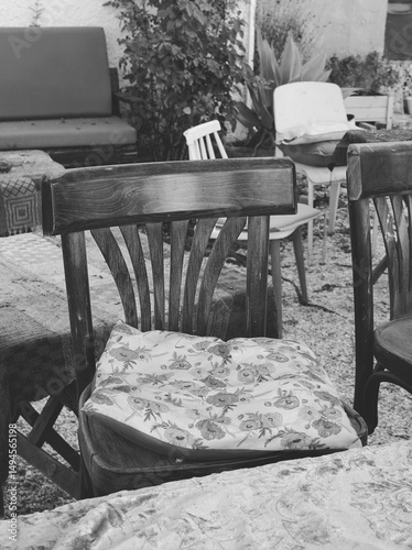 Old Wooden Chair With Cushion In Cafe Monochrome Front View Black And White