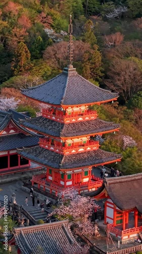 Aerial drone view of the Kiyomizu-dera temple at sunset in Kyoto, Japan