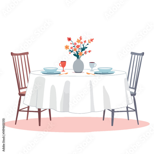 Vsai round dining table with white tablecloth, flowers, and two chairs