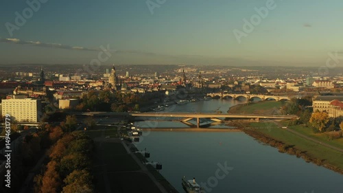 Wallpaper Mural Drone footage of a picturesque coastal settlement with traditional Mediterranean rooftops and a stunning mountain backdrop. The clip captures harmony between natural beauty and human architecture. Torontodigital.ca