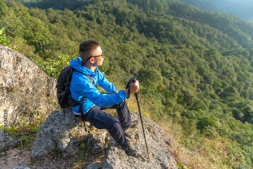 Men traveling with a backpack, hiking in the mountains, travel, travel, lifestyle, success, motivation, adventure concepts, outdoor vacations and sports.