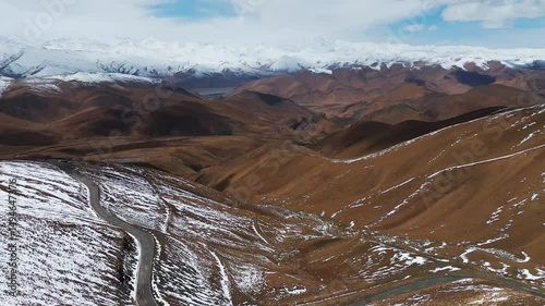aerial view of Mount Everest Mountains range in tibet switchback road leading to base camp 