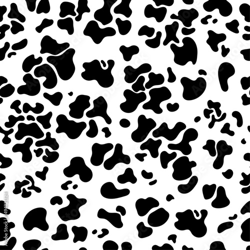 Abstract black leopard, tiger, cheetah, panther or jaguar print or cow skin texture.