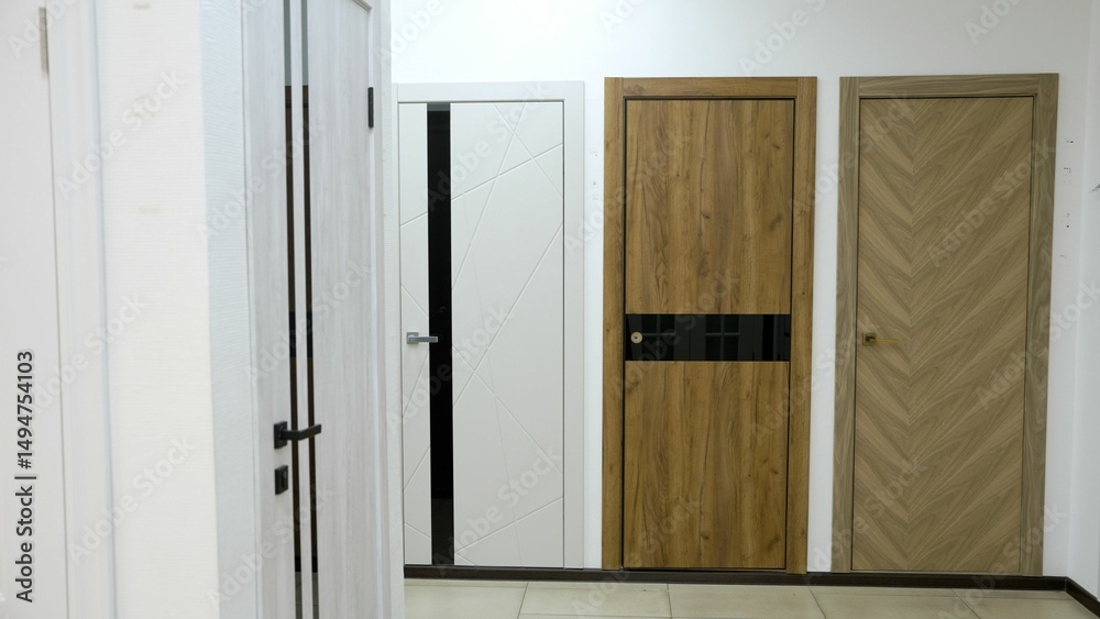Fototapeta premium Modern interior doors showing different design options in showroom