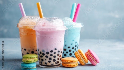 Bubble tea with macarons and colorful straws, perfect for adding fun to your drink presentations.