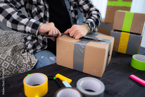 Girl Unboxing Packages With Clothes