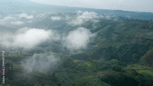 Aerial Cloudscape Over Rolling Hills in 4K

