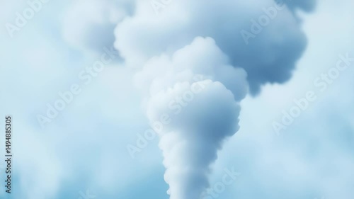 A large plume of white clouds rises in the blue sky. The clouds are densely packed and form tiered, fluffy shapes. The image primarily consists of shades of blue and white.