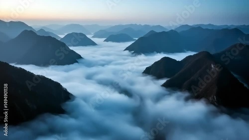 Wallpaper Mural Aerial view of mist-covered mountains at dawn with blue sky   Torontodigital.ca