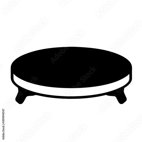 Black silhouette of a round table with short legs and white trim