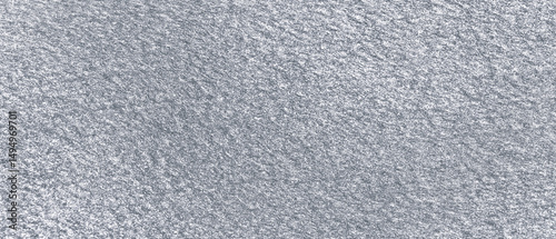 Grey glitter felt wall material. Surface of felted fabric texture abstract background in gray color.